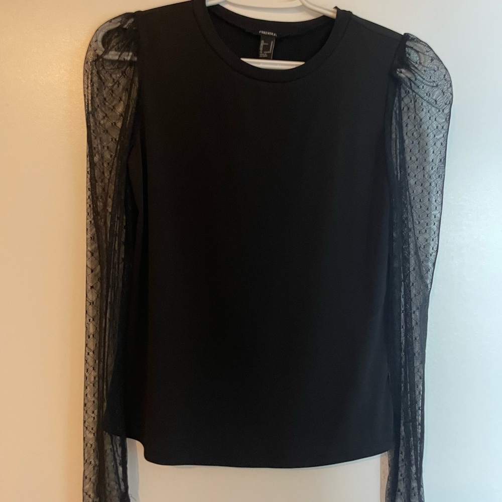 Chic Black Top with Sheer Sleeves